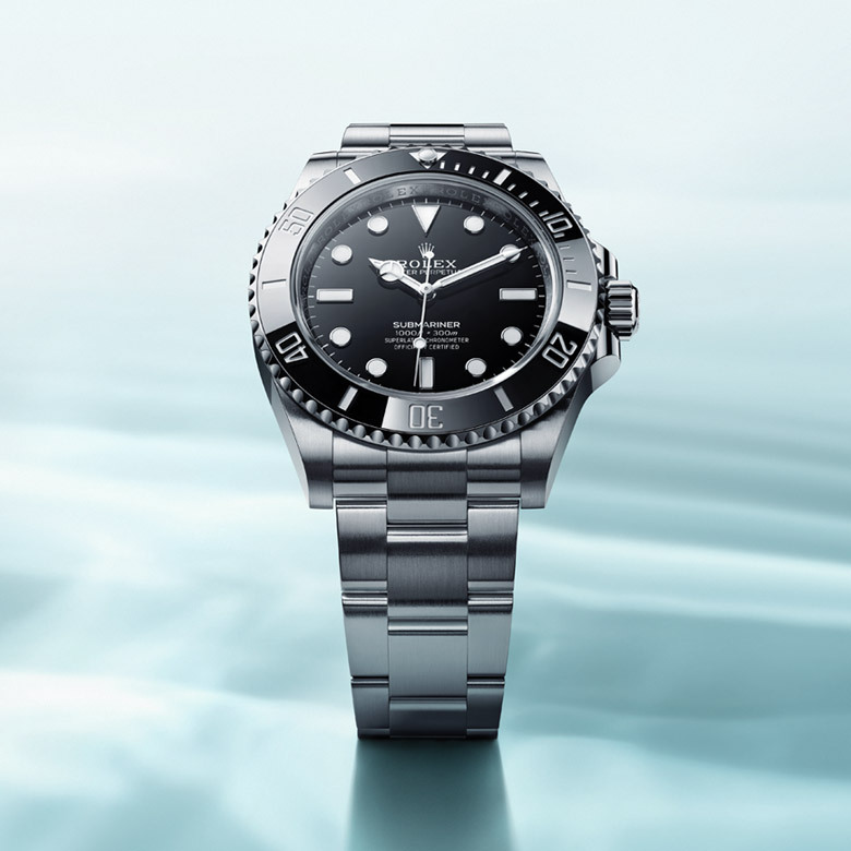 rolex collection banner submariner m124060 0001 0002 2210jva 001 portrait.jpg