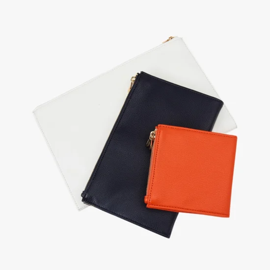 Set tres estuches Wolf Maria cuero blanco, naranja y azul.