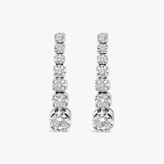Aretes largos Bauer oro blanco 18K y diamantes