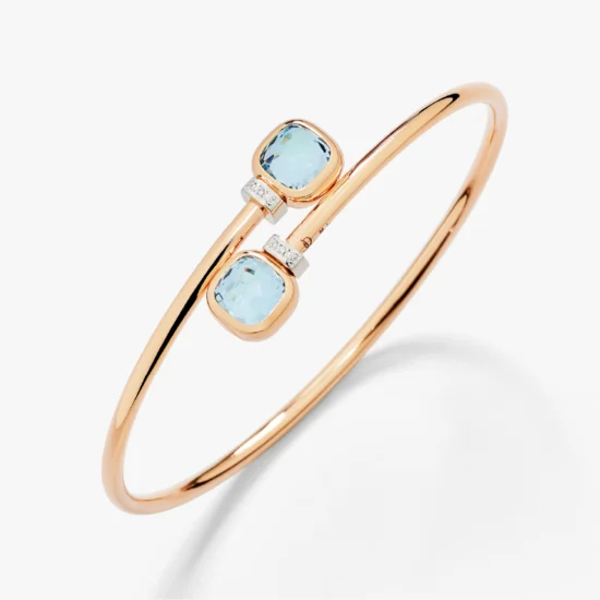 Pulsera Pomellato Nudo Mini de Oro Rosa y Oro Blanco de 18K con Topacios Sky Blue y Diamantes